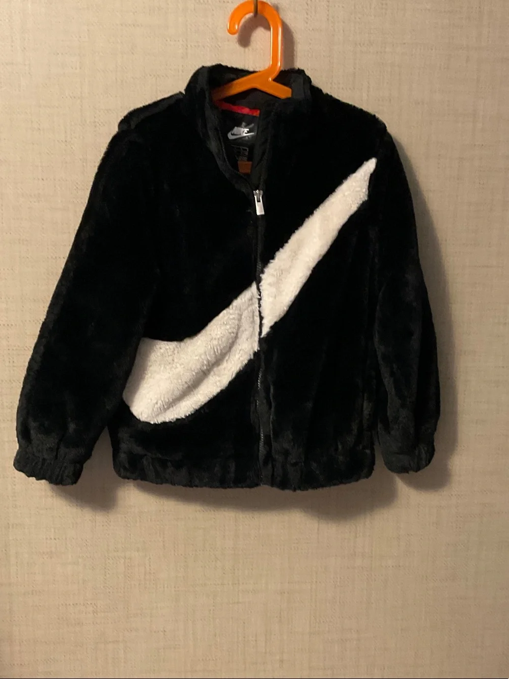 Nike Black Jacket with White Swoosh Accent